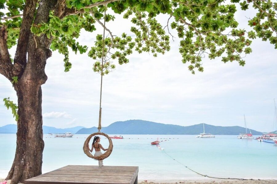 Phuket: Coral Island & Sunset Dinner by Sailing Catamaran - Snorkeling, swimming, and paid water sports