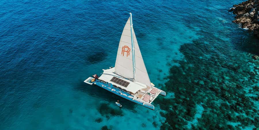 Phuket: Coral & Racha Sunset Luxury Catamaran Party Cruise - Coral Island and Banana Beach at 12:40