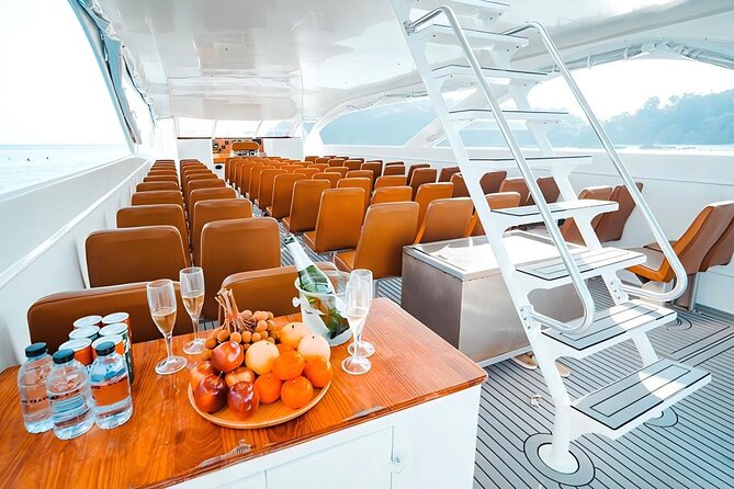 Phuket: Phi Phi, Bamboo & Maiton Speed Catamaran Tour - Phi Phi Don: buffet lunch and the first snorkeling stop