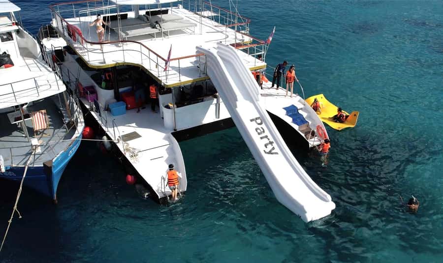 Phuket: Racha & Coral Island Catamaran Tour With Foam Party - Coral Island brings beach time and optional thrills