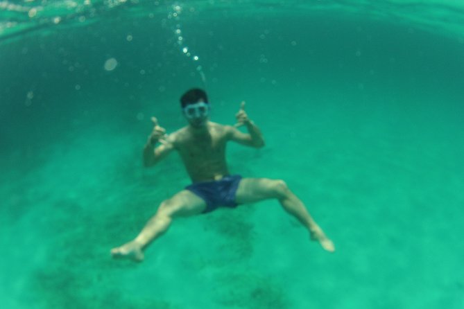 Playa Ses Platgetes Catamaran Private Trip - Swimming, snorkeling, and paddleboarding