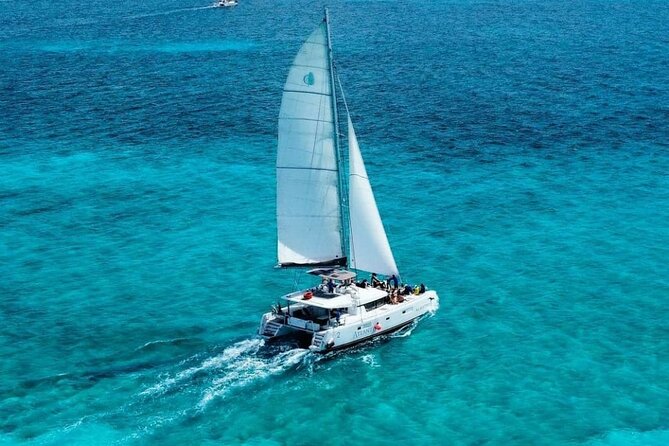 Plus Full Day Catamaran Tour to Isla Mujeres All Inclusive - Sailing from Cancun with drinks and music
