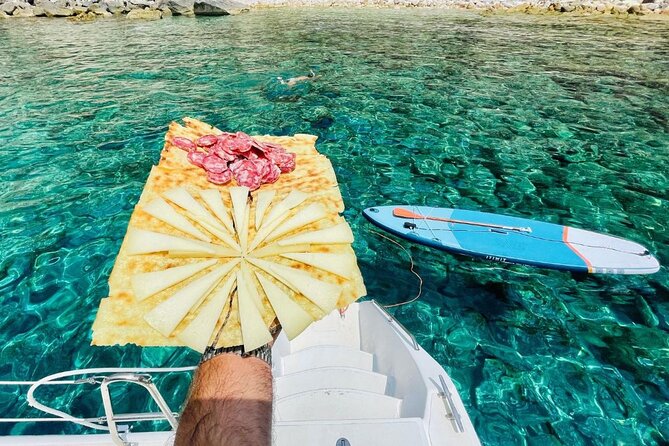 Porto Conte: Half-day catamaran tour with aperitif - The skipper can make or break a boat tour