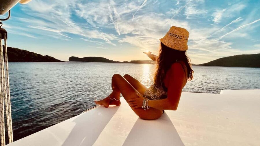 Porto Conte: Sunset catamaran excursion with aperitif - The ride toward Capo Caccia and its sea stacks