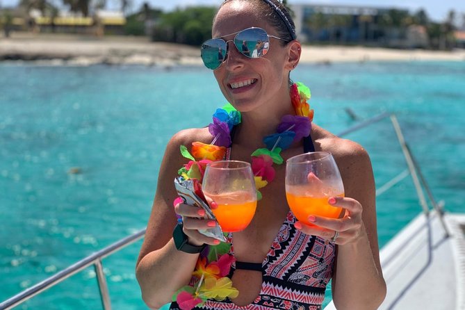 Premium Catamaran Afternoon Sail: Snorkeling and Lunch - The crew, music, and mood onboard