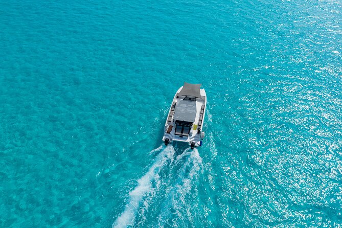 Private Atomic Catamaran Tour to Isla Mujeres - Key Points At A Glance
