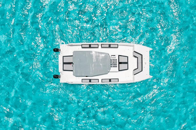 Private Atomic Catamaran Tour to Isla Mujeres - Open Bar And The Adults-Only Rule