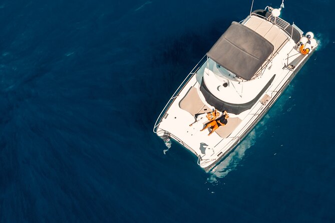 Private Caldera Cruise with Power Catamaran ENJOY incl. Meal & Drinks - Pickup, timing, and the first minutes aboard