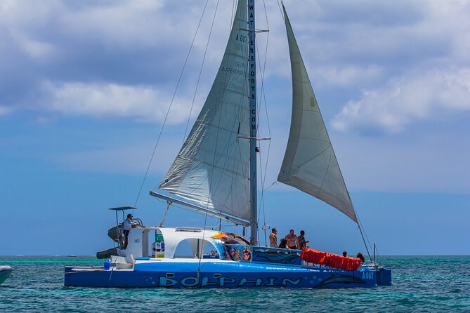 Private Catamaran Adventure Cruise with Rope Swing and Water Slide - Lunch, cocktails, and music on the return