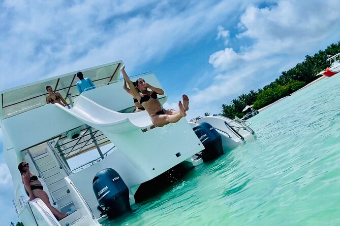 Private Catamaran Cruise with Slide & unlimited drinks - Playa Los Corales and the first water stop
