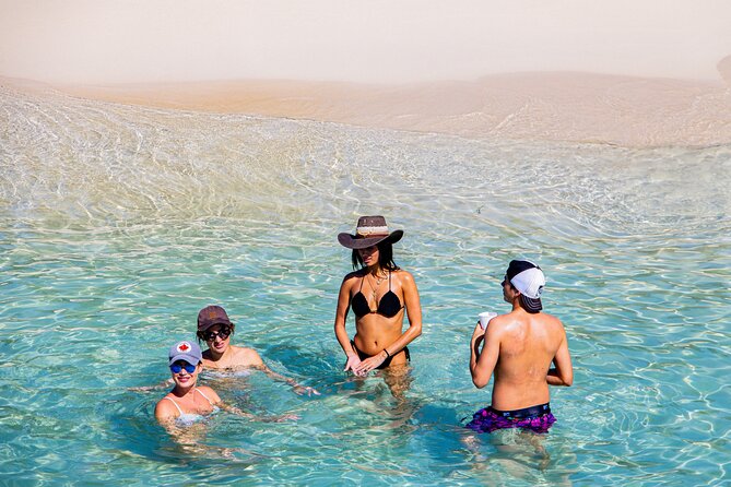 Private Catamaran + Private Parasailing - up to 20 passengers - Boarding the yacht, drinks, music, and safety gear