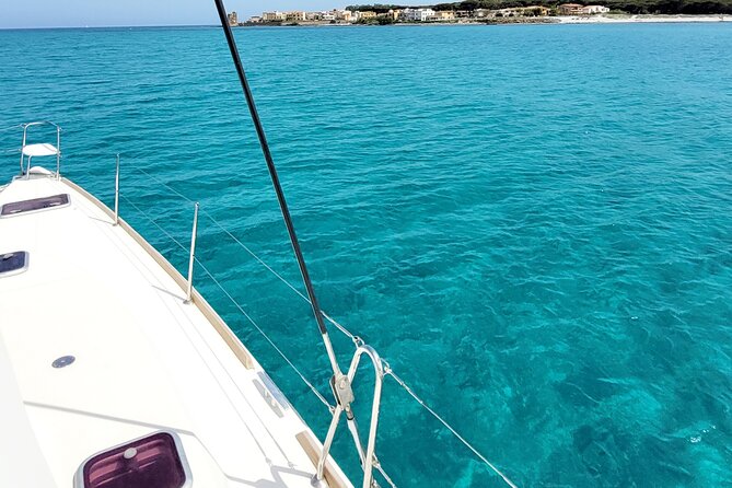 Private catamaran sailing trip around La Caletta -Berchida - Sardinia - Santa Lucia adds a quieter coastal pause