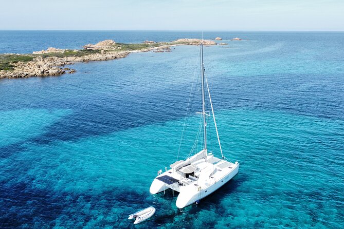 Private catamaran sailing trip around La Caletta -Berchida - Sardinia - Berchida is the final major beach stop