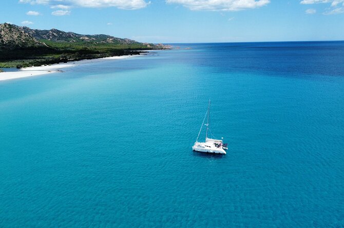 Private catamaran sailing trip around La Caletta -Berchida - Sardinia - What the skipper’s role means for your day