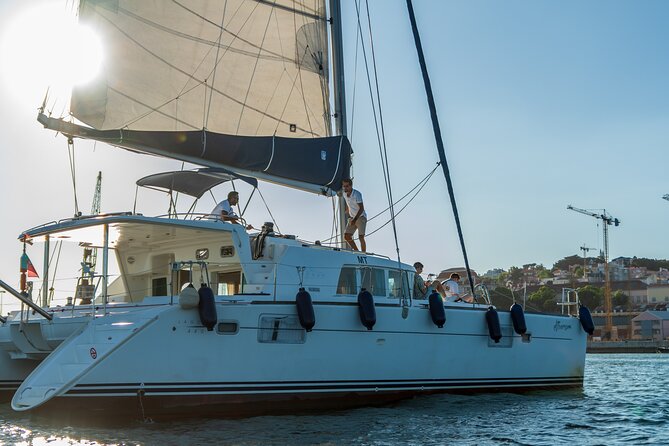 Private Catamaran Tour: Lisbon coast cruise with barbecue and drinks - The swim stop near a beach