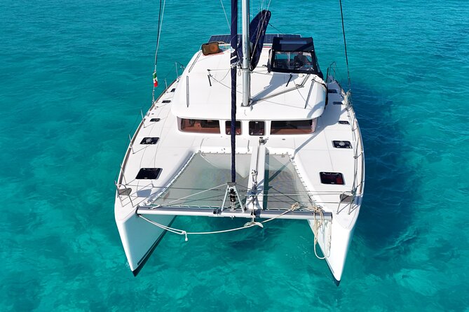 Private Catamaran Tour Super to Isla Mujeres - Drinks, music, and the mood onboard