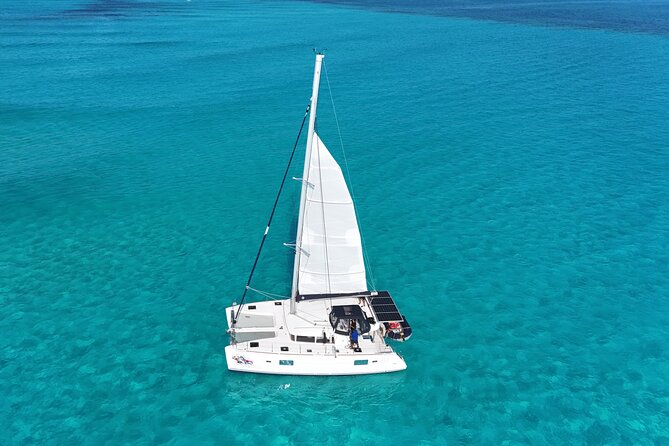 Private Catamaran Tour Super to Isla Mujeres - Out on the catamaran with Cancun and Isla Mujeres in view