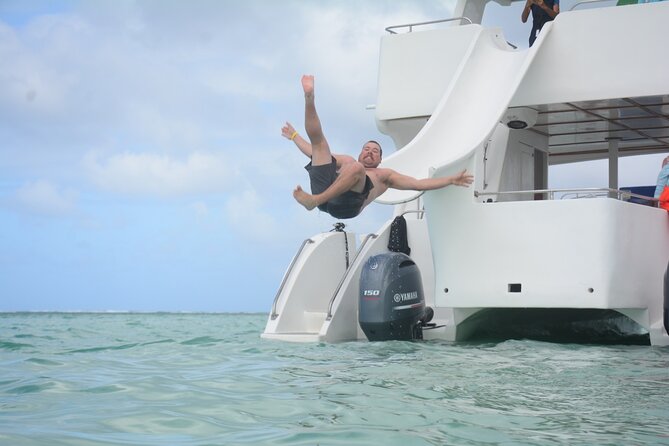 Private Catamaran with Sound system, Slide, Open bar & Snorkeling - Accessibility, languages, and group fit