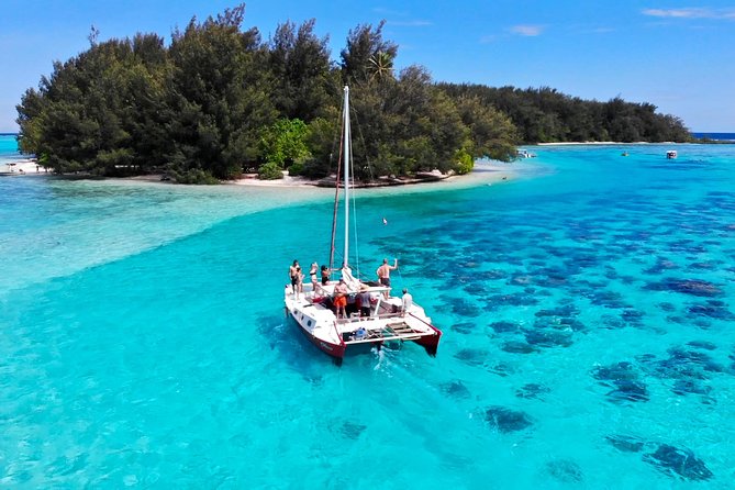 PRIVATE Full Day Tour : Moorea Snorkeling & Sailing on a Catamaran named Taboo - Lagoon snorkeling with rays, sharks, turtles, and tikis