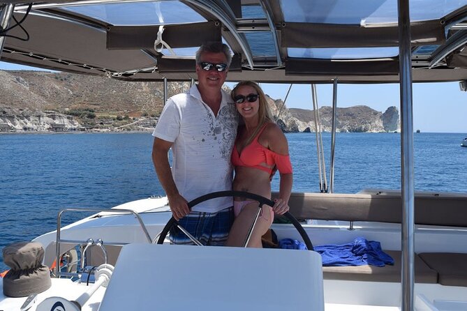 Private Luxury Santorini Catamaran Cruise with Port Pickup - Pickup, meeting points, and practical details