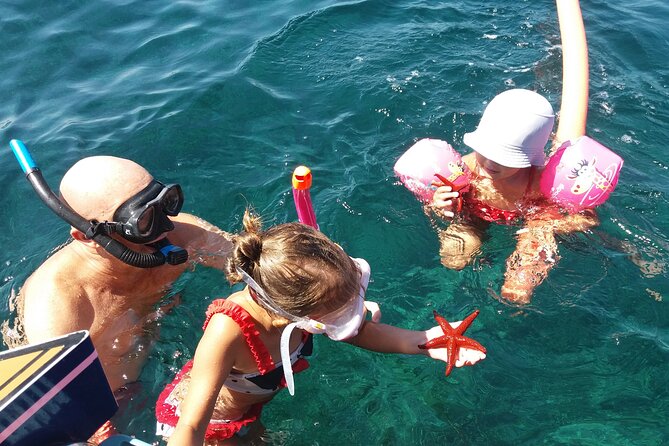 Private ride with sea bath in Solar Catamaran - Guides, local stories, and the human touch
