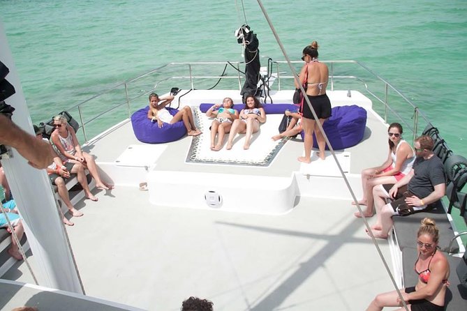 Private Sailing Catamaran - Snorkeling beside coral reef water