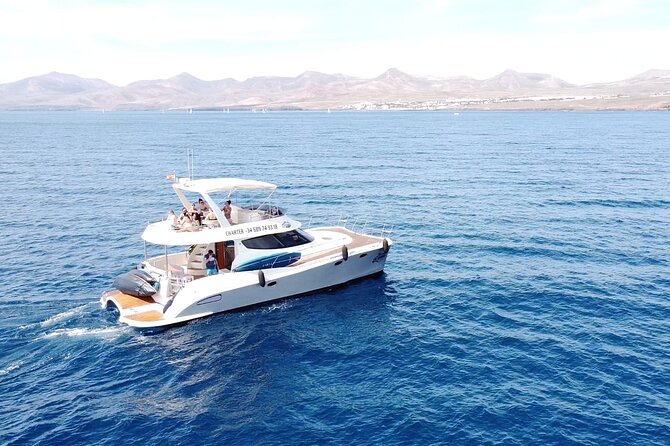 Puerto del Carmen: Catamaran Trip with Water Sports - Setting Sail From Puerto Calero