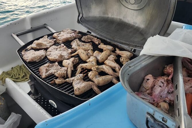 Puerto Plata : Party Boat Catamaran to Sosúa Bay - BBQ lunch, fruit, and Dominican drinks