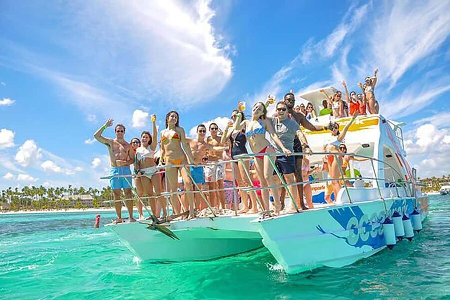 Punta Cana: Catamaran Boat Party with Unlimited Drinks - Boarding with music, snacks, and a party mood