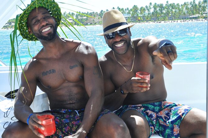 Punta Cana: Catamaran Tour, Reef Snorkeling and Unlimited Drinks! - Drinks, food, and the boat slide