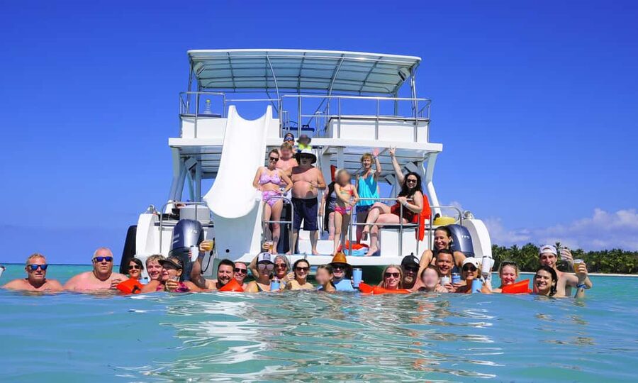 Punta Cana: Catamaran Tour with Reef Snorkeling and Open Bar - The bus ride and arrival at the dock