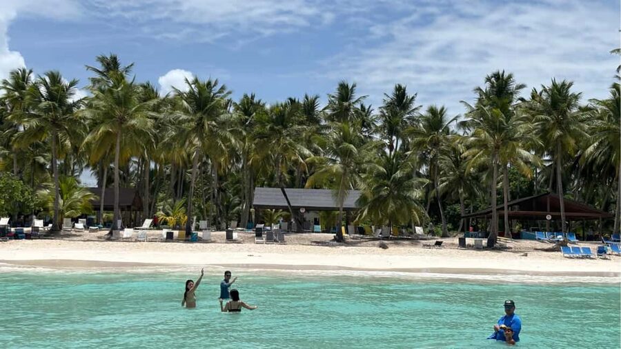 Punta Cana: Exclusive Private Catamaran Tour to Saona Island – VIP Service - Boarding the catamaran at Bayahibe