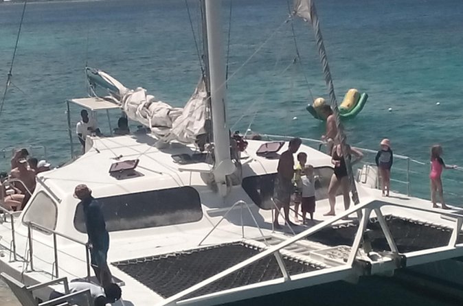 Reggae Catamaran Negril Jamaica Sail N Snorkel - Rick’s Cafe and the 40-minute cliff stop