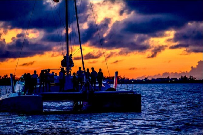Restless Native Catamaran Sunset & Swizzle Cruise - Rum Swizzles, juice, and warm cookies