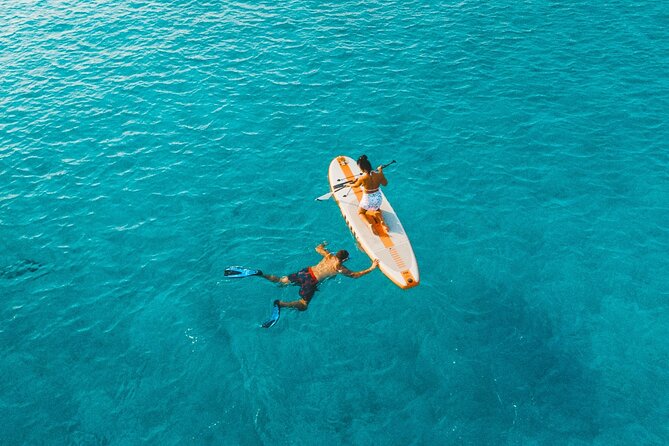 Rethymno: Private Catamaran Cruise with Lunch and Drinks - What the crew adds to the day