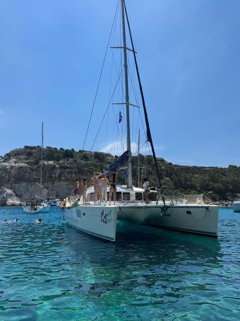 Rhodes: All inclusive Catamaran Escape with Lunch & Drinks - Ladiko Bay and the onboard Greek lunch