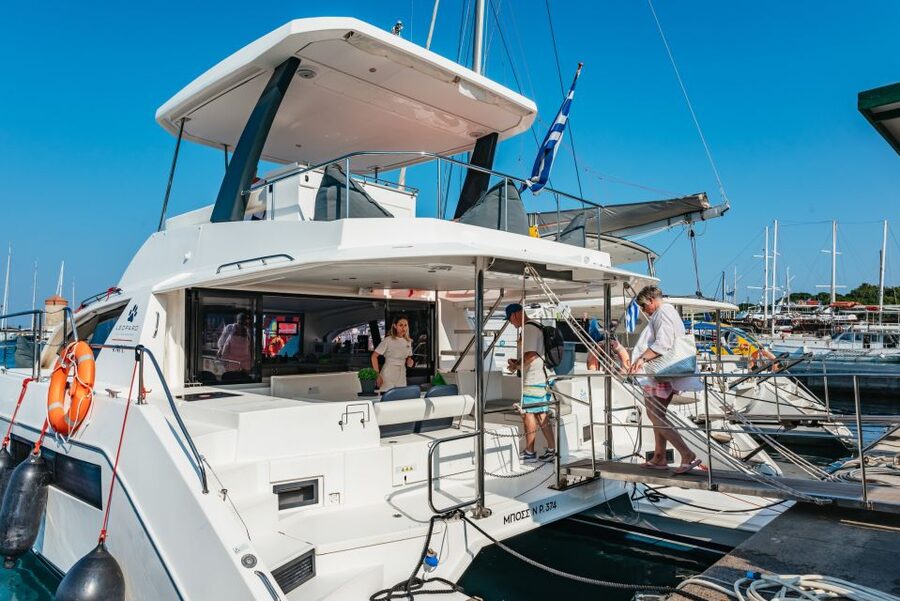 Rhodes: Sunset Catamaran Cruise with Dinner Buffet & Drinks - From Mandraki Harbor toward the east coast
