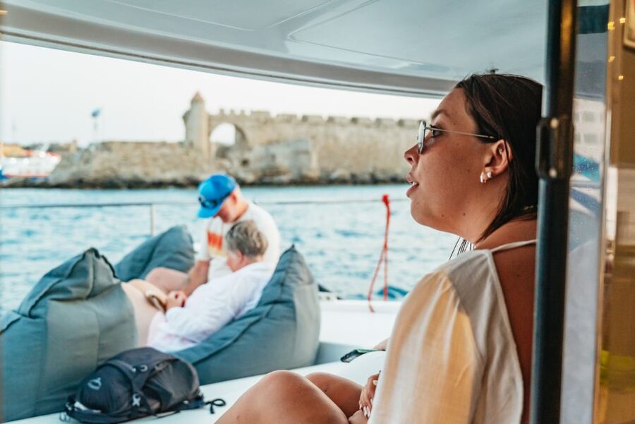 Rhodes: Sunset Catamaran Cruise with Dinner Buffet & Drinks - How the experience handles couples, families, and solo visitors