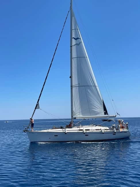 Rhodes: Sunset Catamaran Cruise with Snack, Fruits & Drinks - Weather, comfort, and the small drawbacks