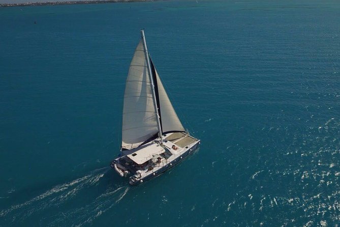 Rising Son Catamaran Adventure in Bermuda - Kayaks, paddleboards, beaches, and possible cliff jumping