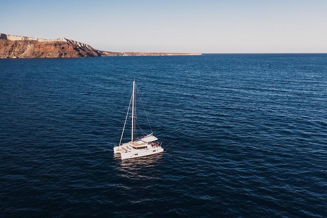 Romantic Sunset Catamaran Caldera Cruise incl. Meal & Drinks - Weather, comfort, and practical packing