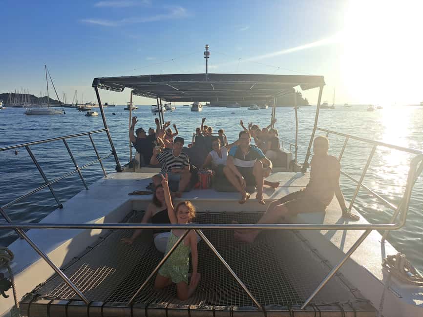 Rovinj: Sunset & dolphin group tours with Catamaran - Practical tips for a smoother evening