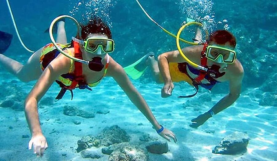 Sailing Splash Tour Speedboat, Snorkel, and Catamaran - Driving a two-person speedboat across the Caribbean