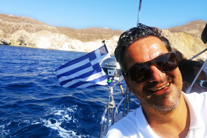 Sailsational Luxury Santorini Catamaran Sunset Cruise with Dinner - Mesa Pigadia, swimming, and dinner on deck