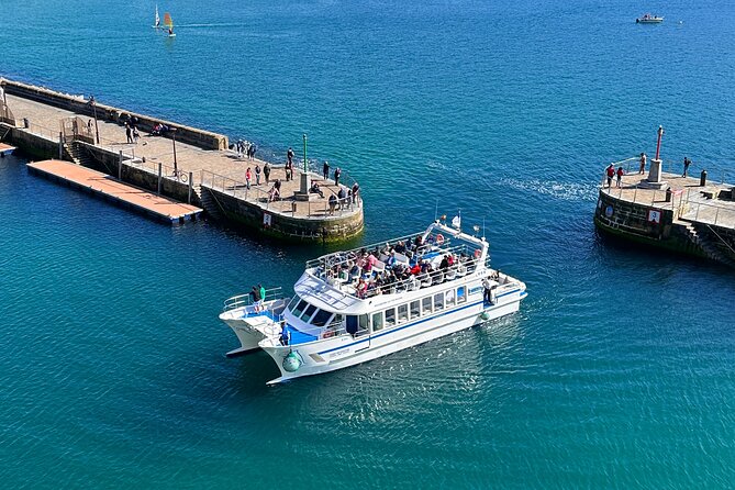 San Sebastian: Eco-Friendly Panoramic Catamaran Cruise - Leaving the harbor for La Concha
