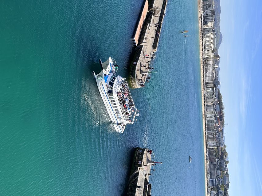 San Sebastian: Sustainable Catamaran Cruise with Audio Guide - Leaving the harbor for La Concha Bay