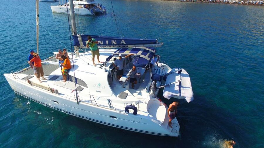 Santorini: 7-Hour Private Catamaran Cruise with Food & Drink - Red Beach and White Beach from the sea