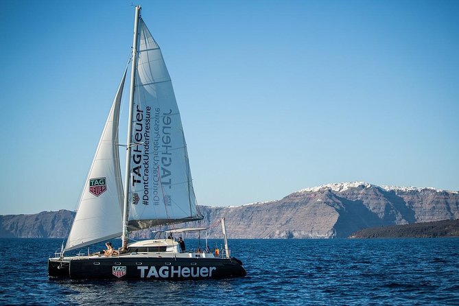 Santorini Adventurous Catamaran Experience with Snorkeling - Mesa Pigadia, Black Mountain, and Indian Rock