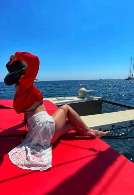 Santorini: Adventurous Catamaran Experience with Snorkeling - Lunch, drinks, and the social side of the boat