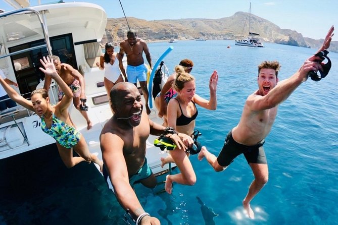 Santorini All-inclusive Catamaran Cruise with Thirassia Stop - Red Beach is a photo stop, not a beach day